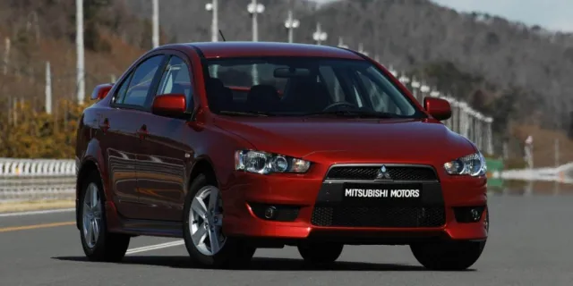 Mitsubishi Lancer — фото 7