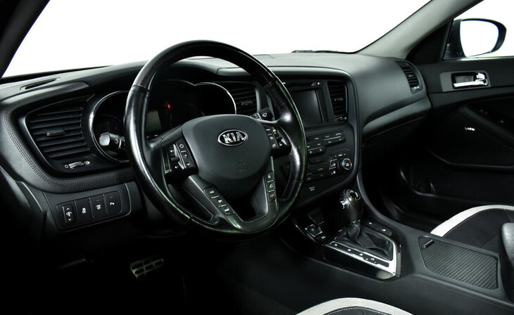 Kia Optima - Фото 9