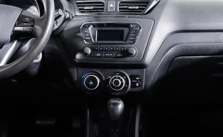 Kia Rio - Фото 13