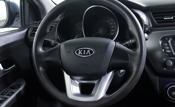 Kia Rio - Фото 11