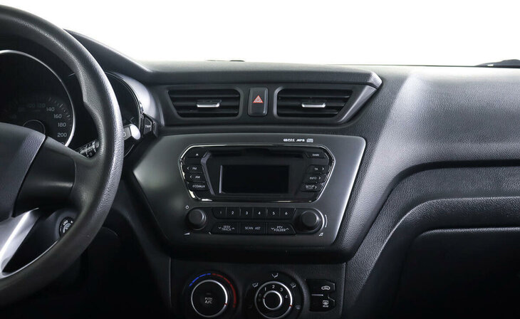 Kia Rio - Фото 12