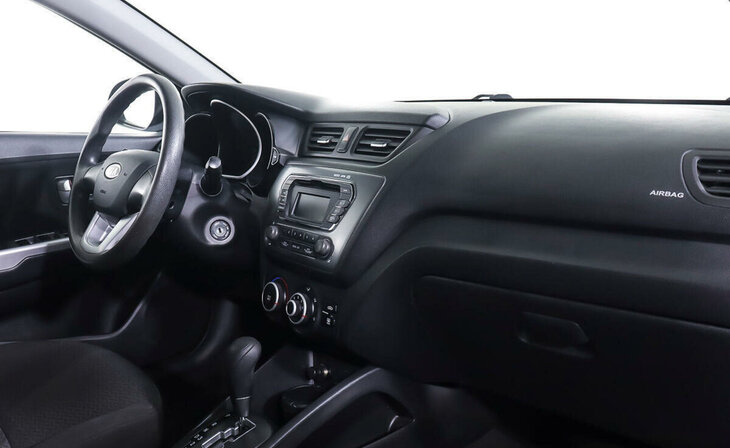 Kia Rio - Фото 8