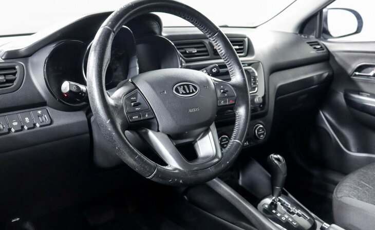 Kia Rio - Фото 9