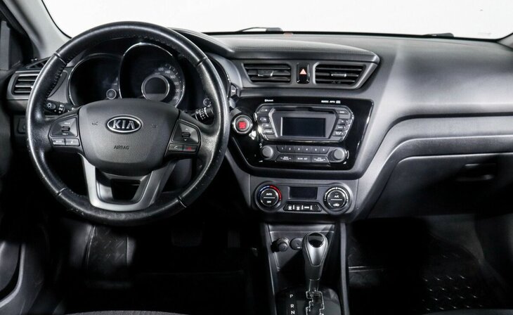 Kia Rio - Фото 8