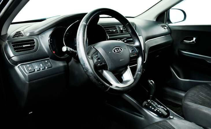 Kia Rio - Фото 8