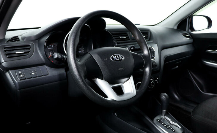 Kia Rio - Фото 8