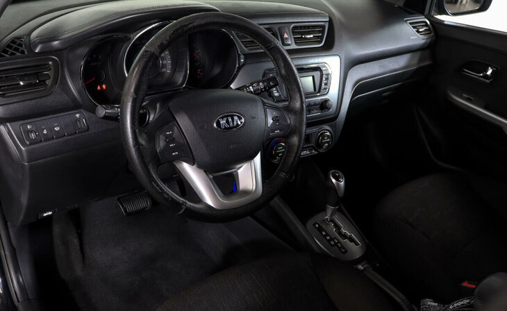 Kia Rio - Фото 8