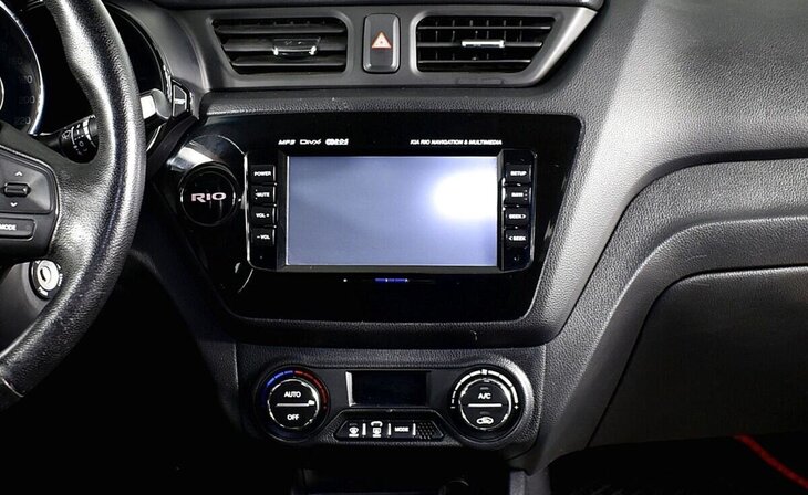 Kia Rio - Фото 9