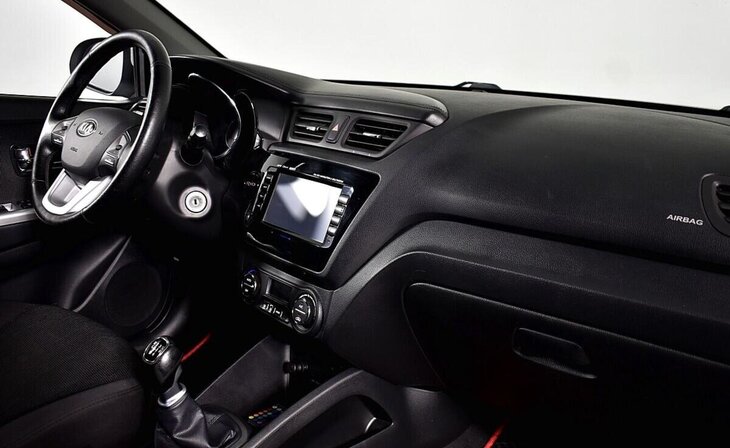 Kia Rio - Фото 6