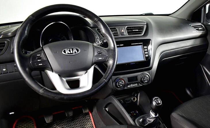Kia Rio - Фото 8