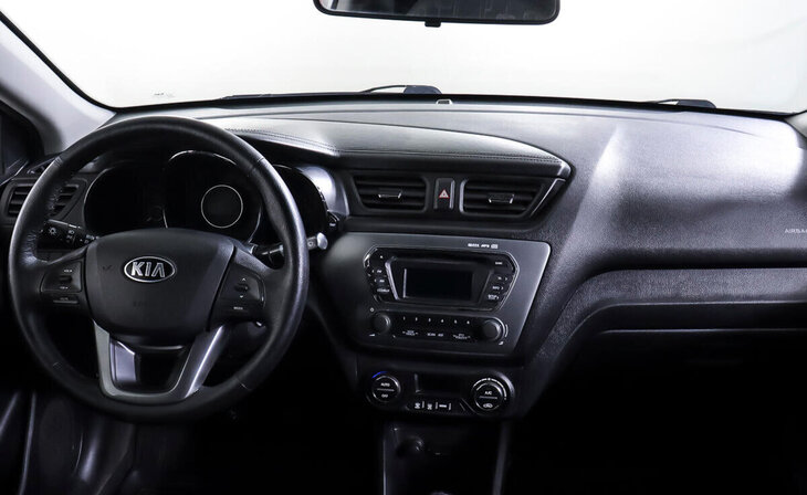 Kia Rio - Фото 10