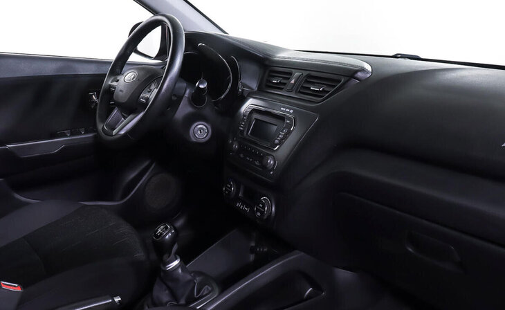 Kia Rio - Фото 8