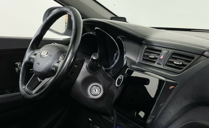 Kia Rio - Фото 8