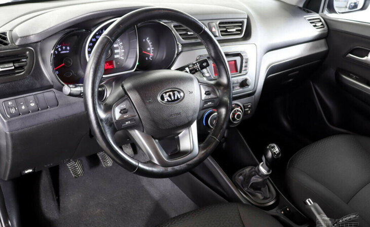 Kia Rio - Фото 8
