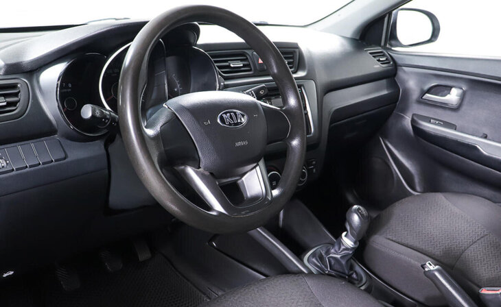 Kia Rio - Фото 8