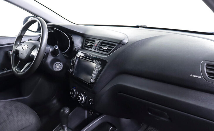 Kia Rio - Фото 11