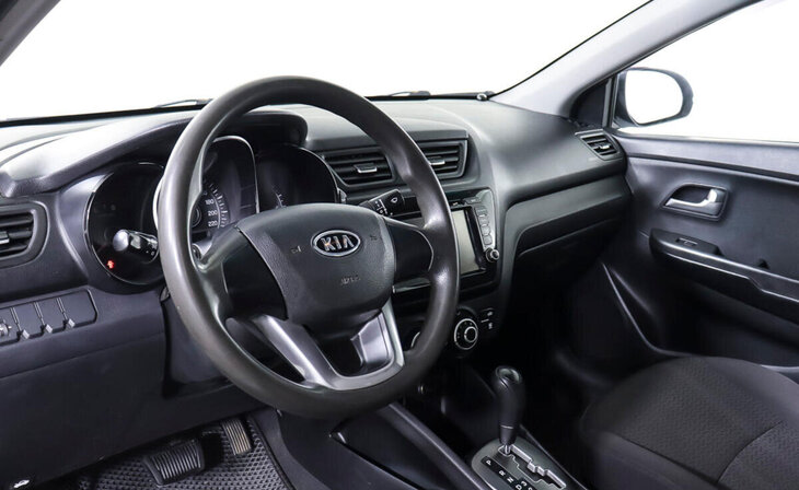Kia Rio - Фото 13