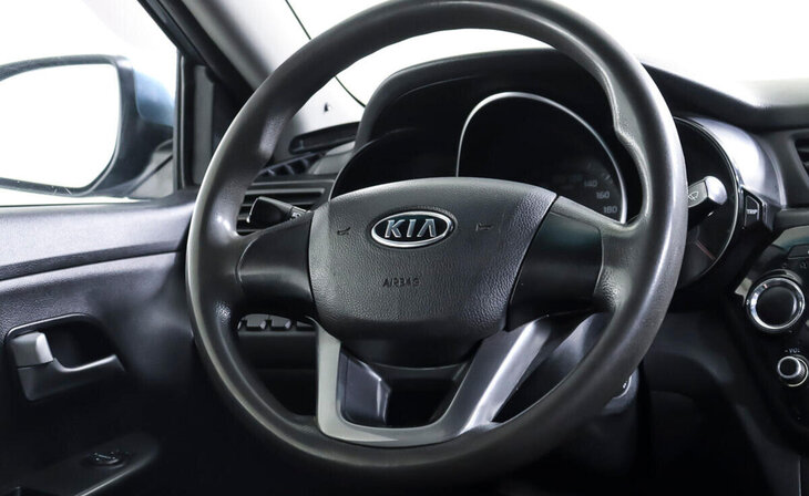 Kia Rio - Фото 14