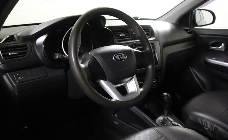 Kia Rio - Фото 7