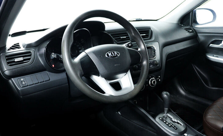 Kia Rio - Фото 8