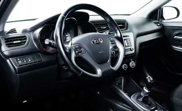 Kia Rio - Фото 9
