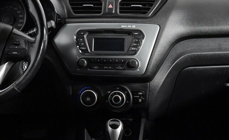 Kia Rio - Фото 11