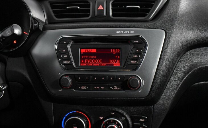 Kia Rio - Фото 12