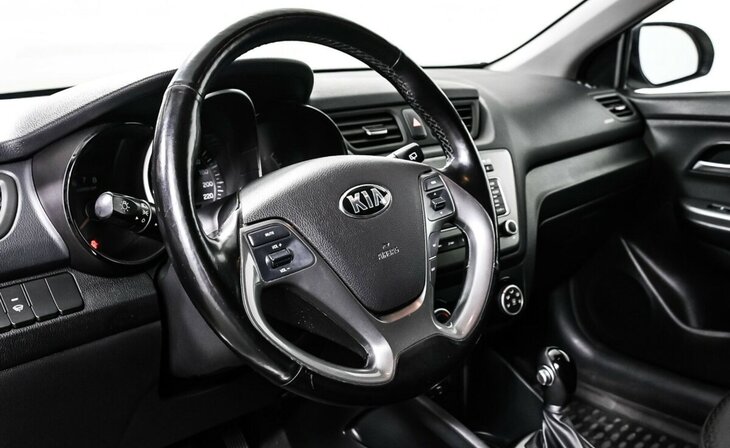 Kia Rio - Фото 9