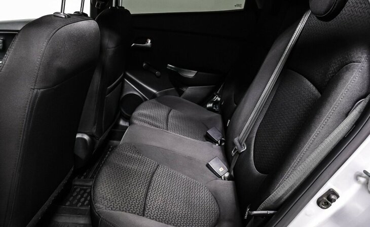 Kia Rio - Фото 11
