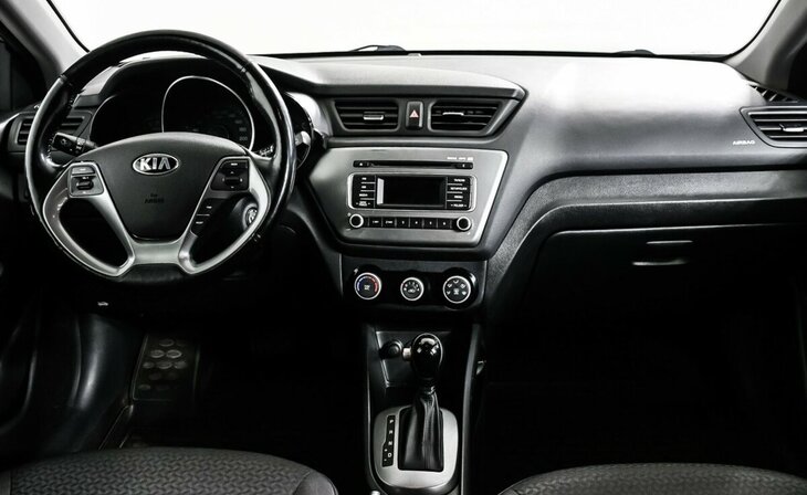 Kia Rio - Фото 8