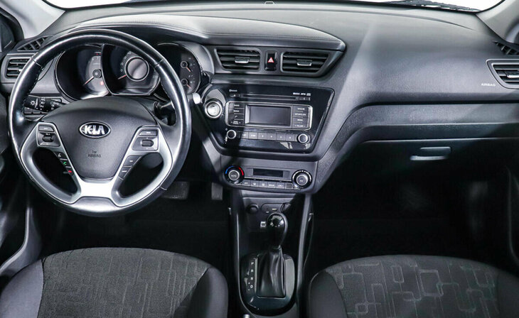 Kia Rio - Фото 10