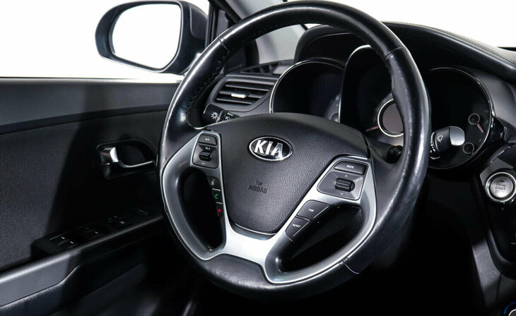 Kia Rio - Фото 11