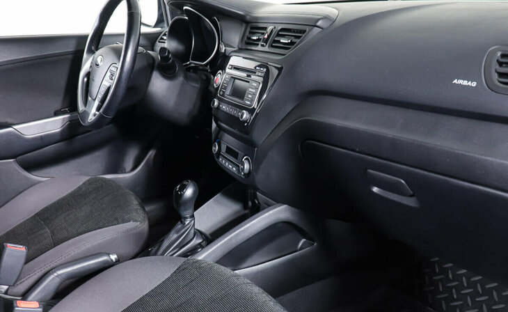 Kia Rio - Фото 8