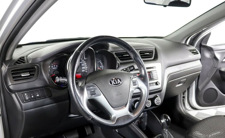 Kia Rio - Фото 8