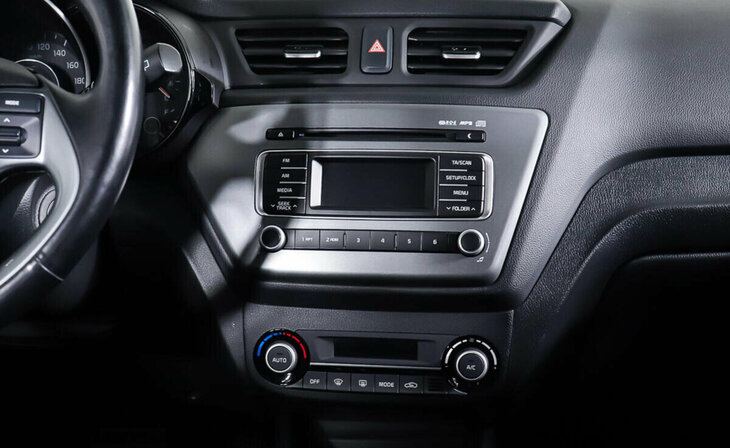 Kia Rio - Фото 12