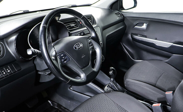 Kia Rio - Фото 10