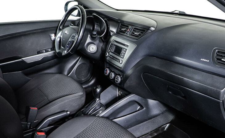 Kia Rio - Фото 8