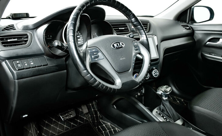 Kia Rio - Фото 9