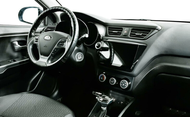 Kia Rio - Фото 8