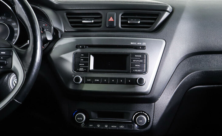 Kia Rio - Фото 12