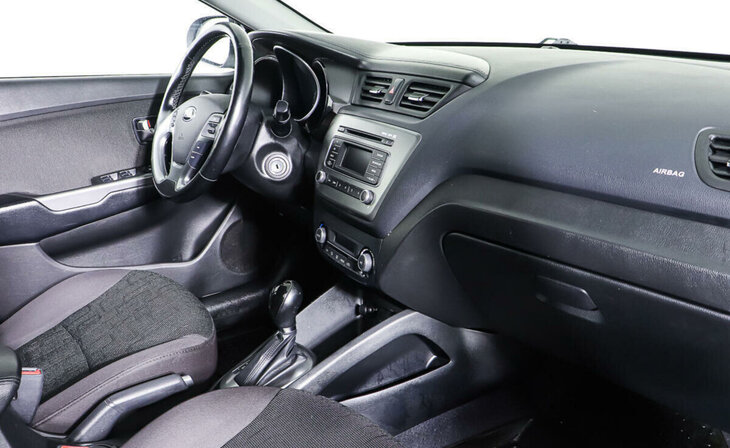 Kia Rio - Фото 8