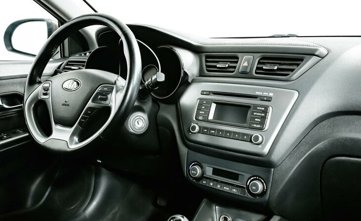 Kia Rio - Фото 9