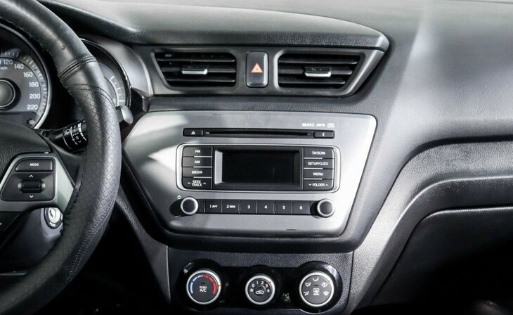 Kia Rio - Фото 8