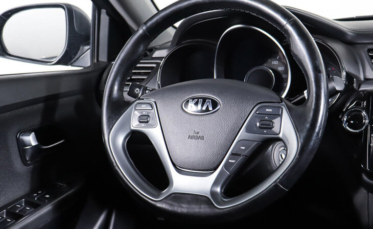 Kia Rio - Фото 10