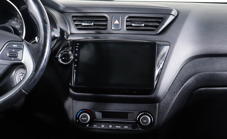 Kia Rio - Фото 12