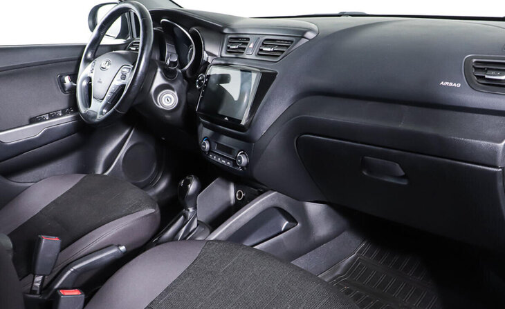 Kia Rio - Фото 8