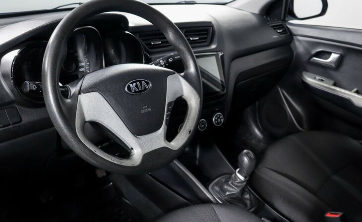 Kia Rio - Фото 9