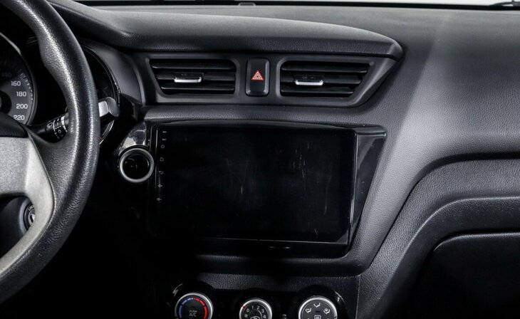 Kia Rio - Фото 10