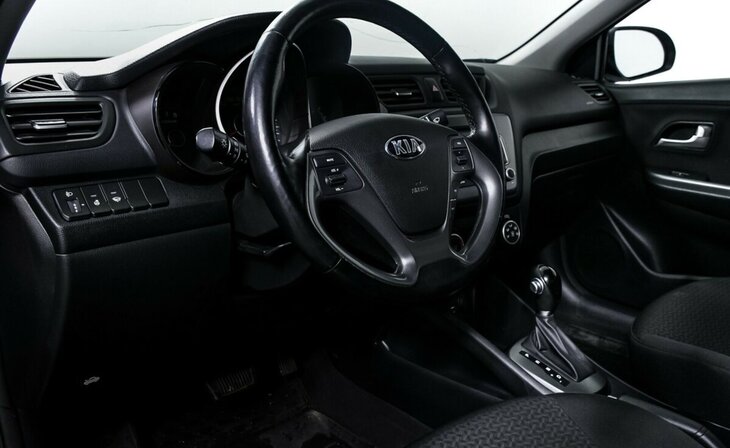 Kia Rio - Фото 8