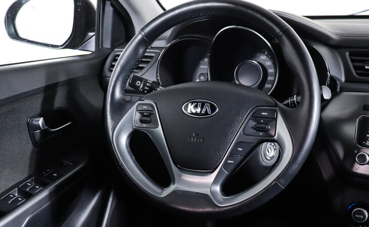 Kia Rio - Фото 11